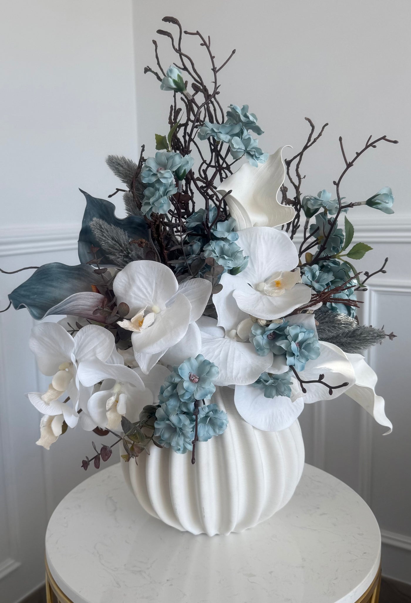 Iceblue blooms flower Arrangement